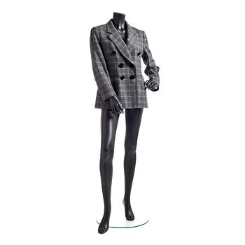 686. MOSCHINO CHEAP AND CHIC, a grey chequered wool jacket.