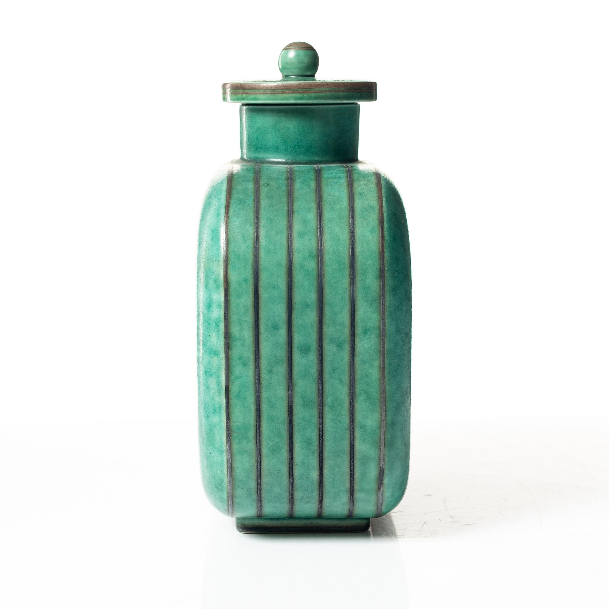 Wilhelm Kåge, an 'Argenta' lidded vase and a plate, Gustavsberg.