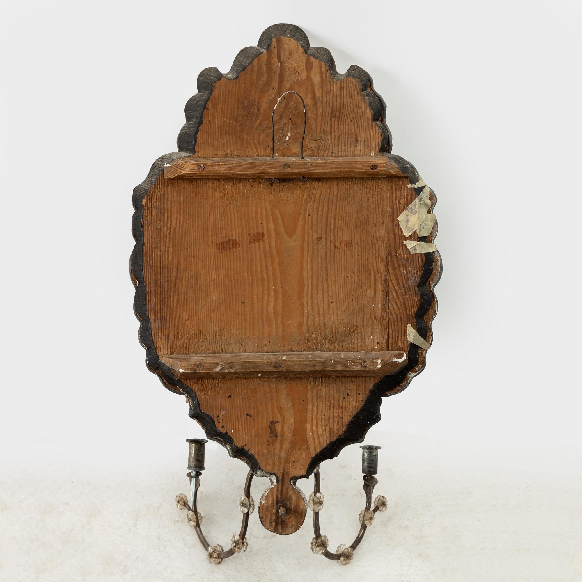A mirror wall sconce for two candles, Bohemia, mid-18th century, Late Baroque.