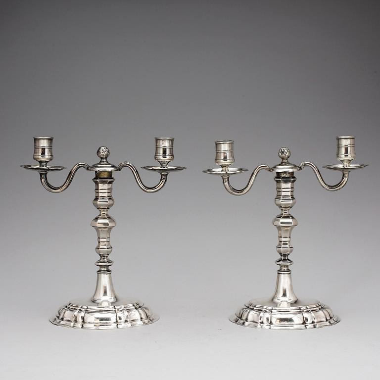 A pair of Polish 18th century silver candelsticks, marks of George Kahlert der Jüngere, Breslau (1732-1772).