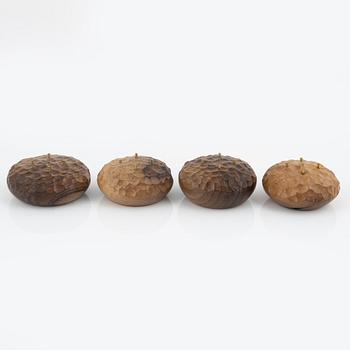 Magnus Ek, a set of four walnut wood canapé holders for Oaxen Krog.