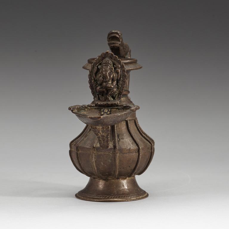 A copper alloy Tibetan/Nepalese Butter Lamp 'Sukunda', 19th Century.