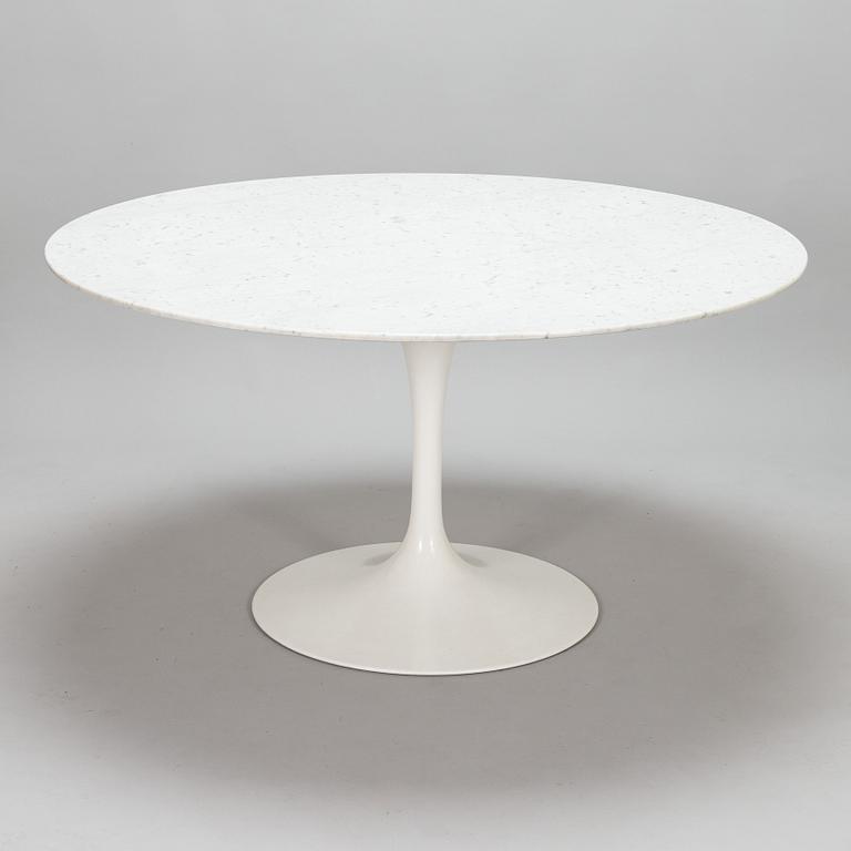 Eero Saarinen, a 1970s 'Tulip' marble-top table with six chairs.