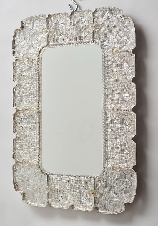 Carl Fagerlund, a Swedish Modern cast glass framed mirror, Orrefors 1940-50's.