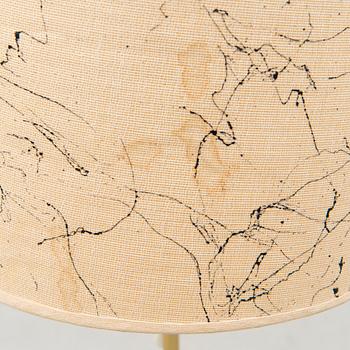 A mid-20th Century floor lamp.