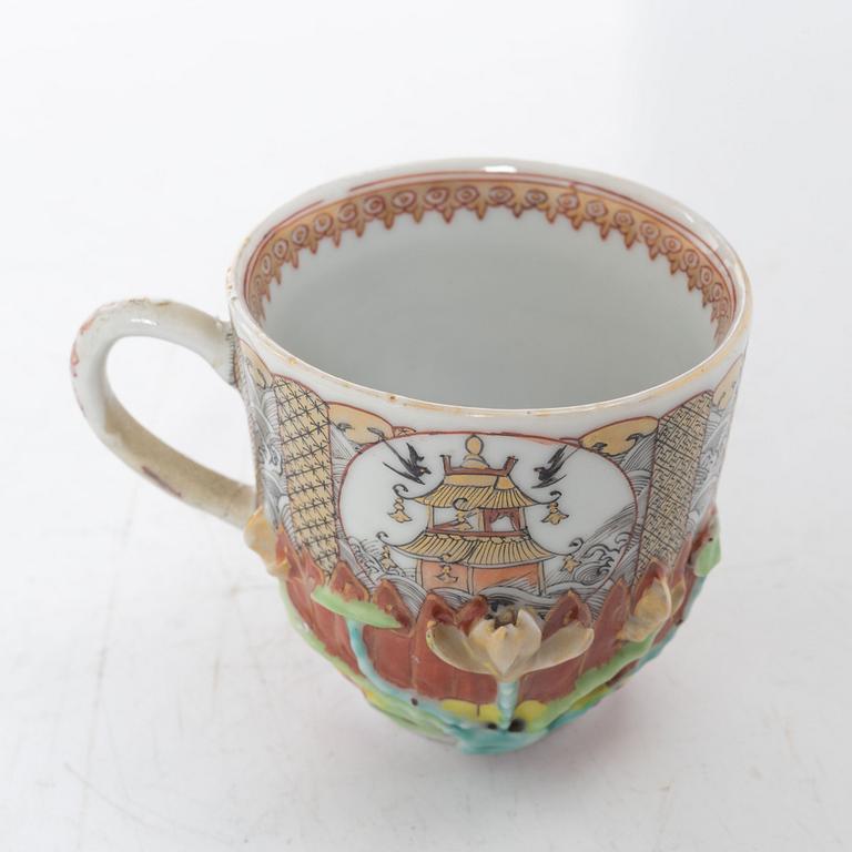 A small Chinese famille rose porcelain tureen with cover and stand, two salt cellars, Qing dynasty, Qianlong (1736-95).