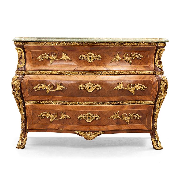 A Swedish Rococo chest of drawers by Christian Linning dated 1761 (master in Stockholm 1744-1779).