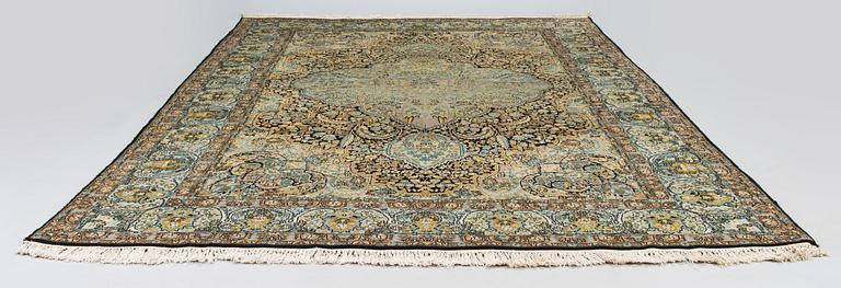 An old part silk oriental rug, ca 278 x 178 cm.
