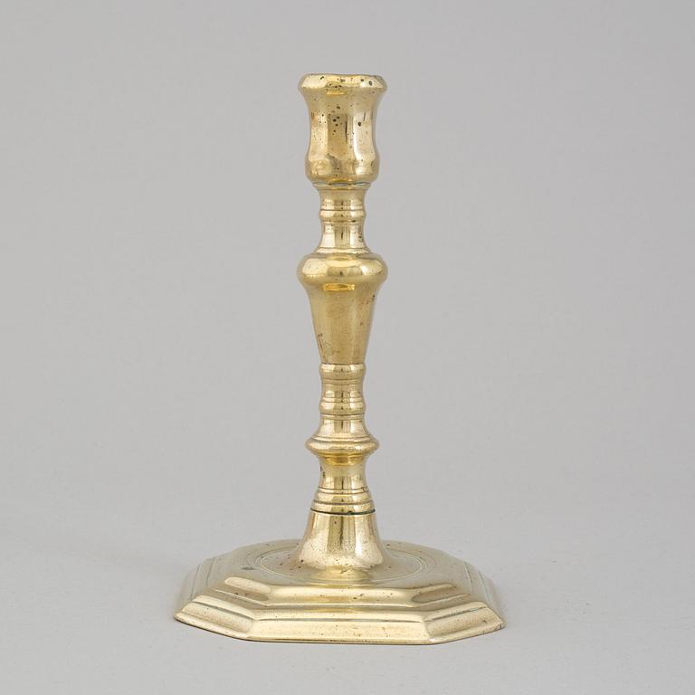 An 18th century bronze candlestick.