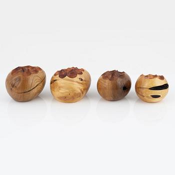 Magnus Ek, a set of four wooden appetize holders for Oaxen Krog.