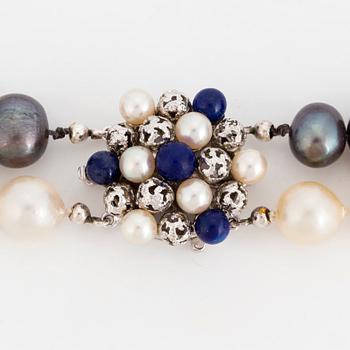 A cultured pearl necklace. Clasp 18K white gold with pearl and lapis lazuli.