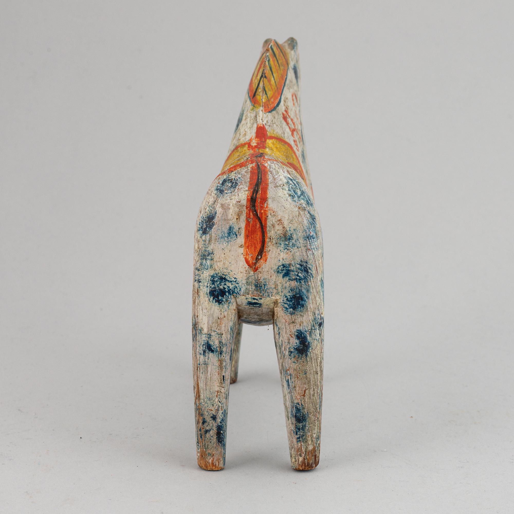 A wooden carved and painted 'Dalahäst', early 20th century.