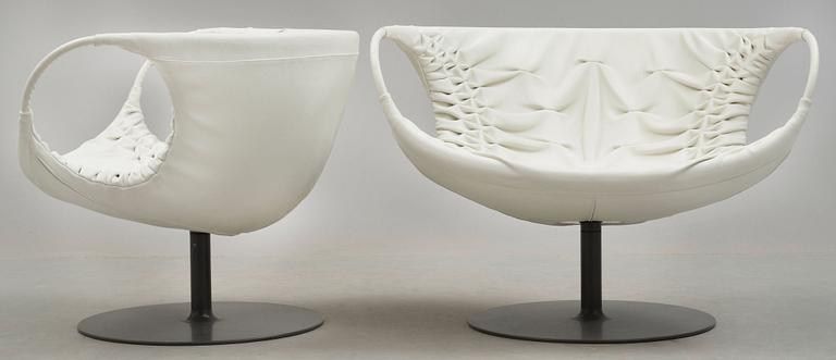 A pair of Patricia Urquiola 'Smock' steel and white leather easy chairs, Moroso, Italy.