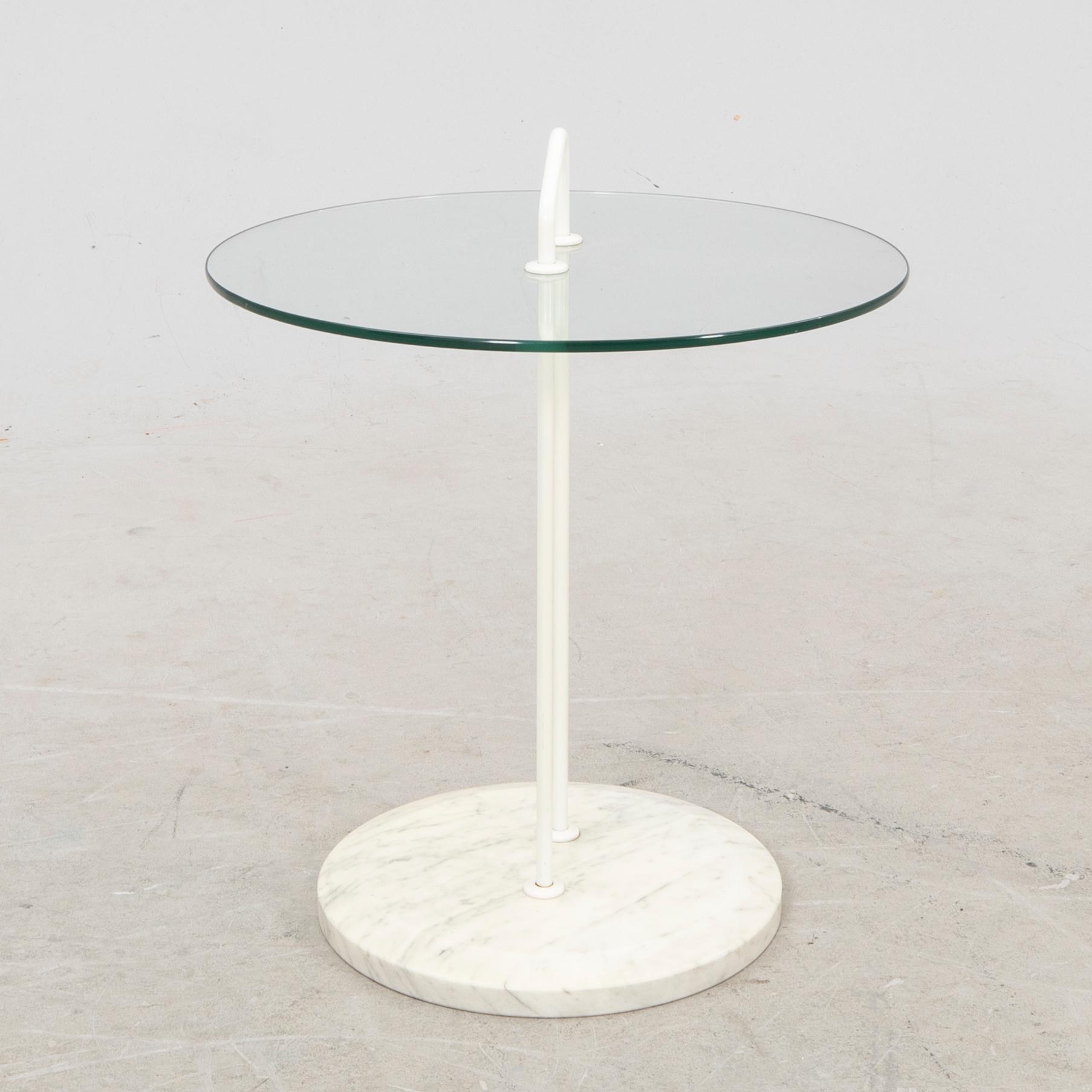 A late 20th century marble and glass side table.