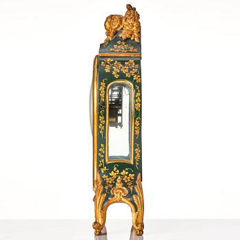 A Swedish rococo mantel clock by N Berg.