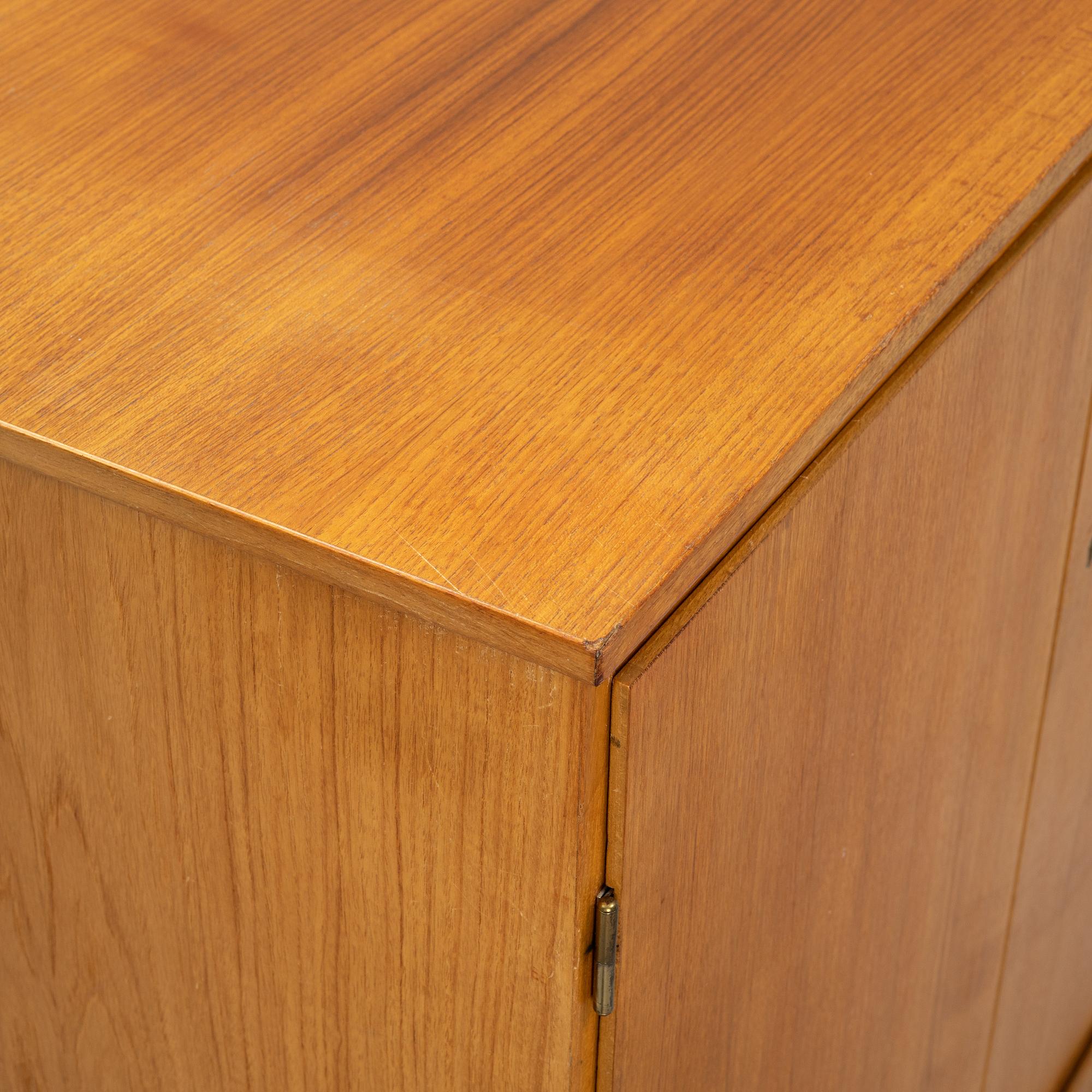 A 1950's/60's teak cabinet.