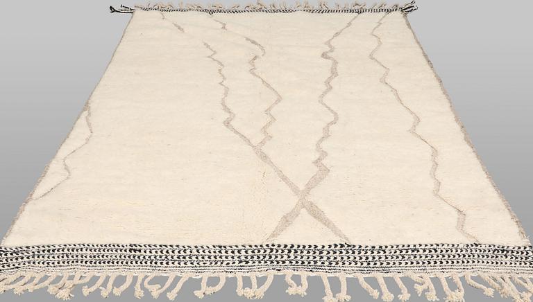 A Moroccan carpet, approx. 290 x 200 cm.