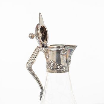 A silver and glass Art Nouveau claret jug, David Andersen, Stockholm, 1901.