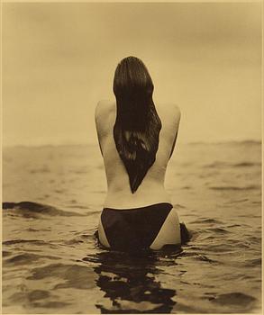 67. Herb Ritts, "Woman in Sea, Hawaii", 1988.