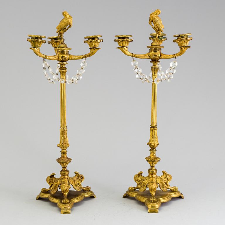 A pair of neorenaissance candelabras, about 1900.