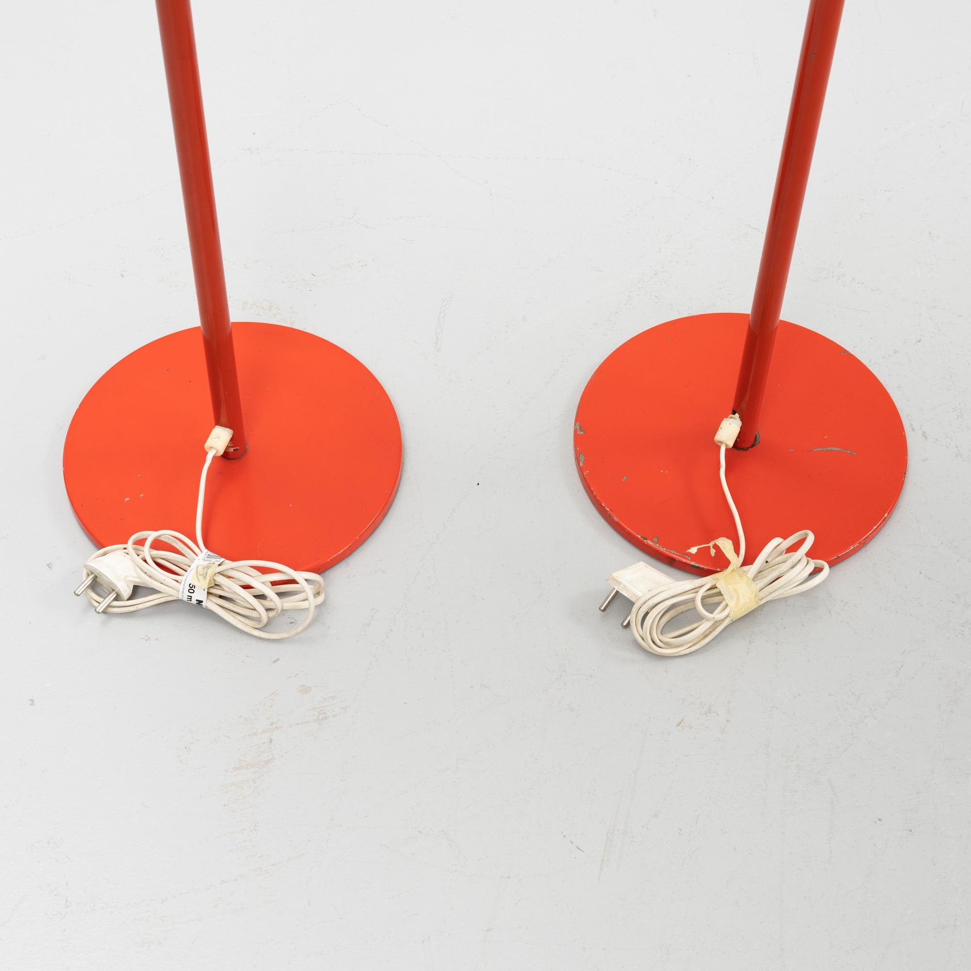 Uno & Östen Kristiansson, a matched pair of red floor lights, Luxus, Vittsjö.