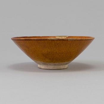 A Chinese yellow-glazed ceramic bowl, Liao dynasty (916-1225).