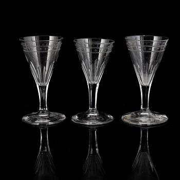 A mixed lot of nineteen 19th century Empire wine- and champagne glasses.