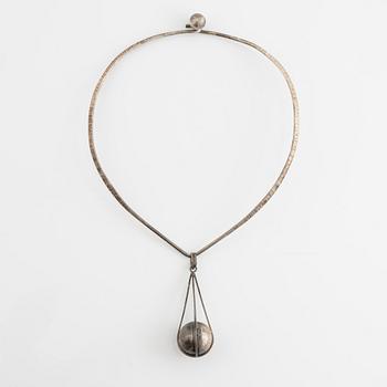 Silver necklace with pendant.