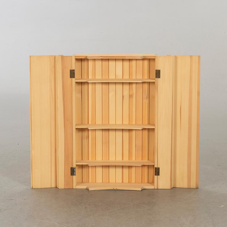 OLOF PIRA, A PINEWOOD WALL CUPBOARD DESIGN OLOF PIRA.