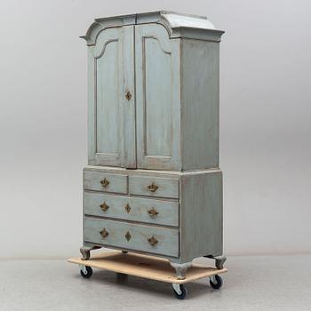 A late 18th century rococo painted cabinet.