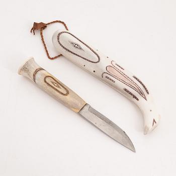 A reindeer horn knife by Olle Olsson, signed.