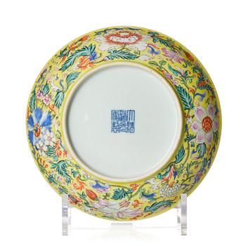 948. A yellow ground famille-rose 'floral' dish, Qing dynasty, Daoguang seal mark and period of (1821-50).