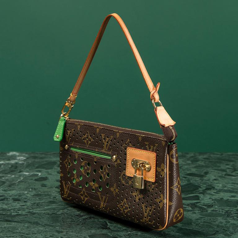 A CLUTCH by Louis Vuitton.