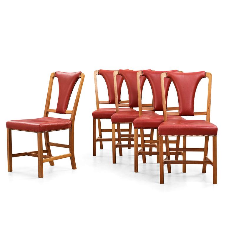 Josef Frank, a set of five walnut and red leather dining chairs, Svenskt Tenn, model 2229, mid 20th century.