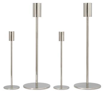 31. A set of four stainless steel candle sticks 'Noster', by Jonas Lindvall Skandiform.