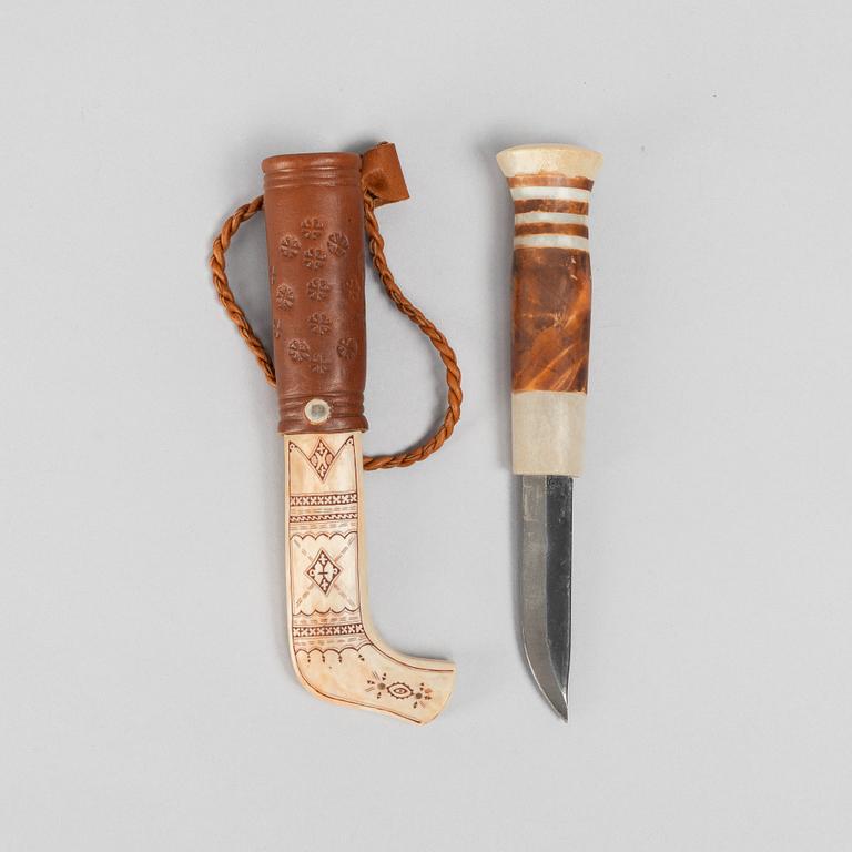 Lars Levi Sunna, a reindeer horn knife, signed.