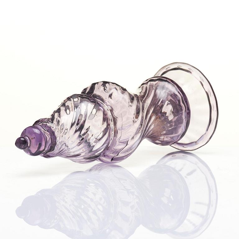 An amethyst coloured suger shaker and a cut glass goblet, 18th century.