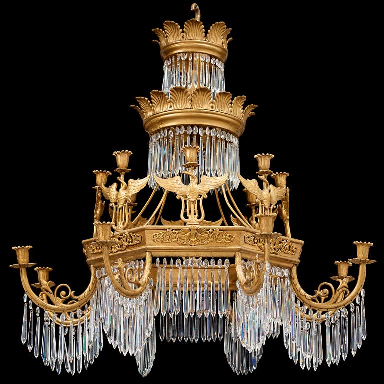 A German 19th century sixteen-light chandelier in the manner of Karl Friedrich Schinkel.