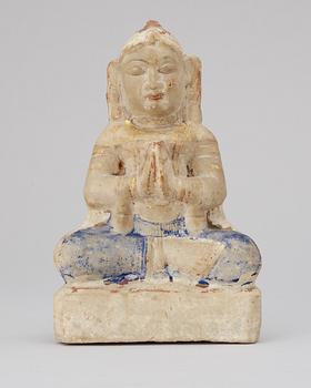 525. A stone figure. India 19th century.