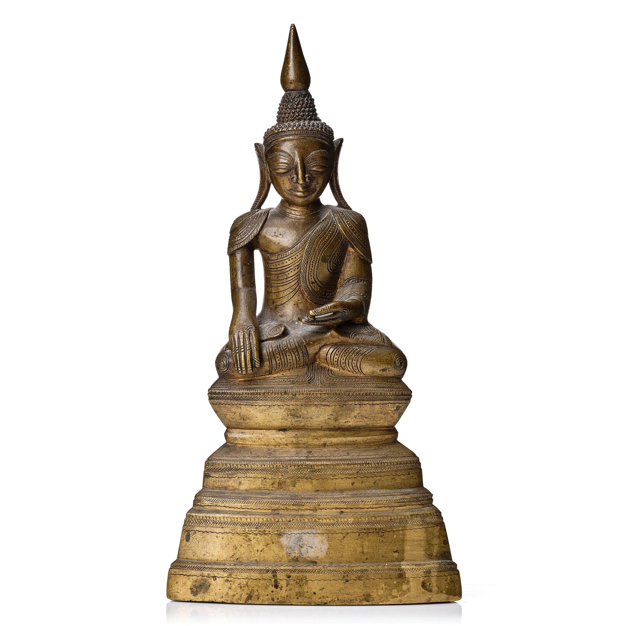 A Burmese bronze figure of Buddha, circa 1800.