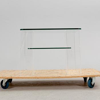 A late 20th century glass and plexi side table.