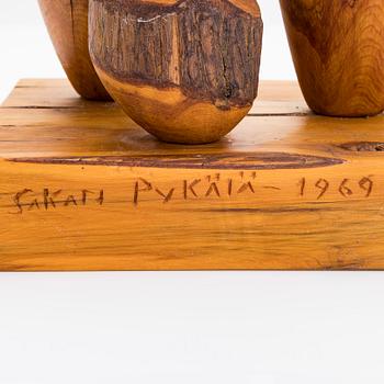 Sakari Pykälä, sculpture, wood, signed and dated 1969.