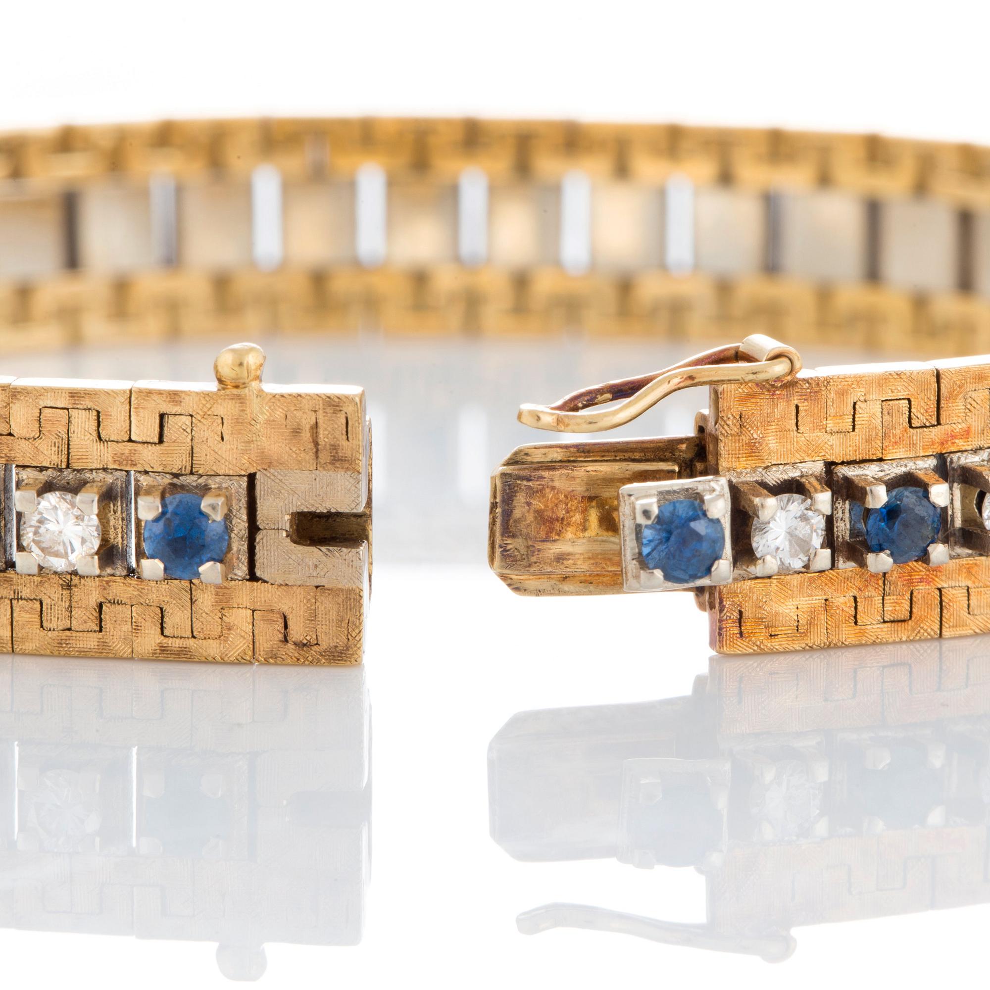 Armband 18K guld med runda briljantslipade diamanter total vikt ca 1 ct och safirer ca 1.5 ct.