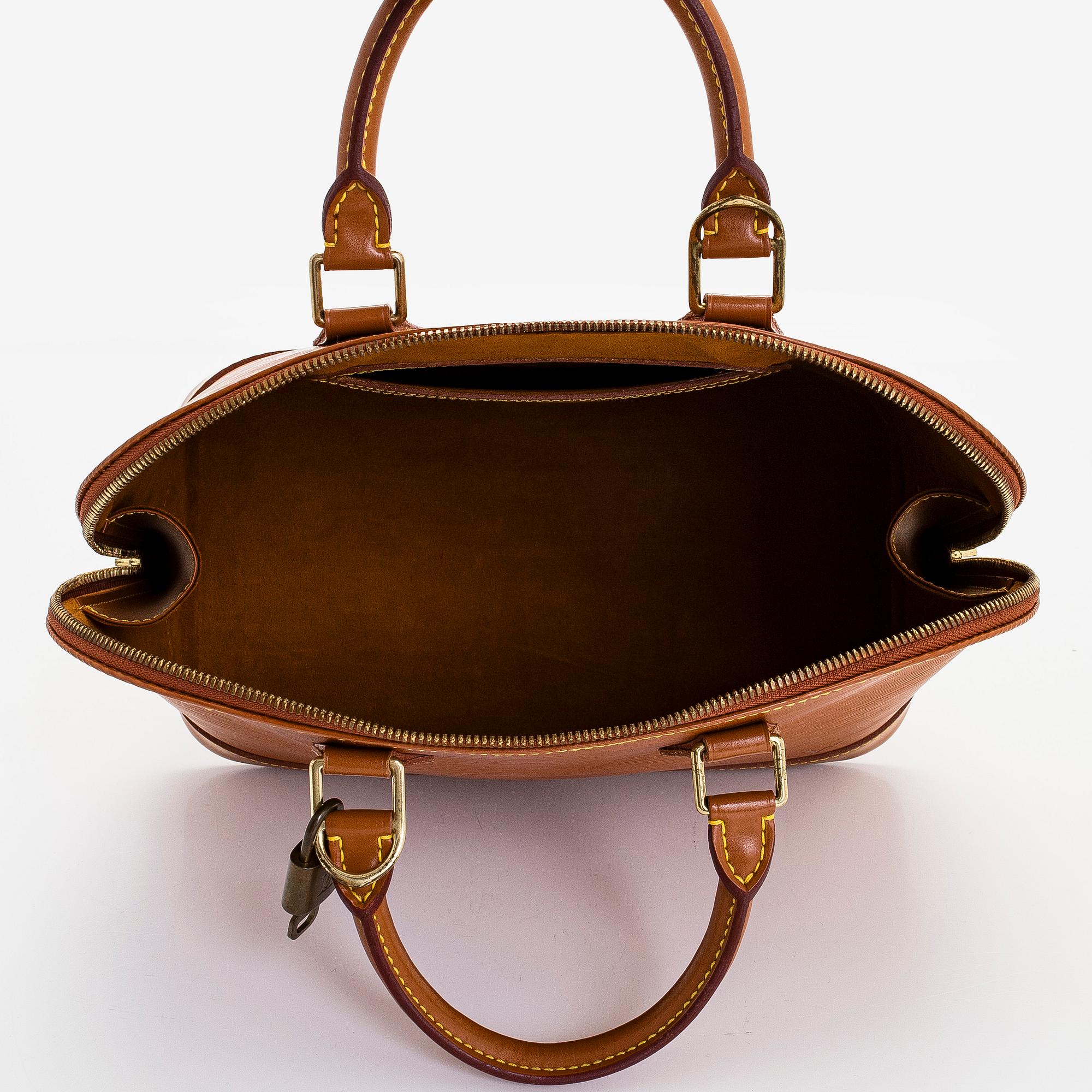 Louis Vuitton, an Epi Leather "Alma" bag.