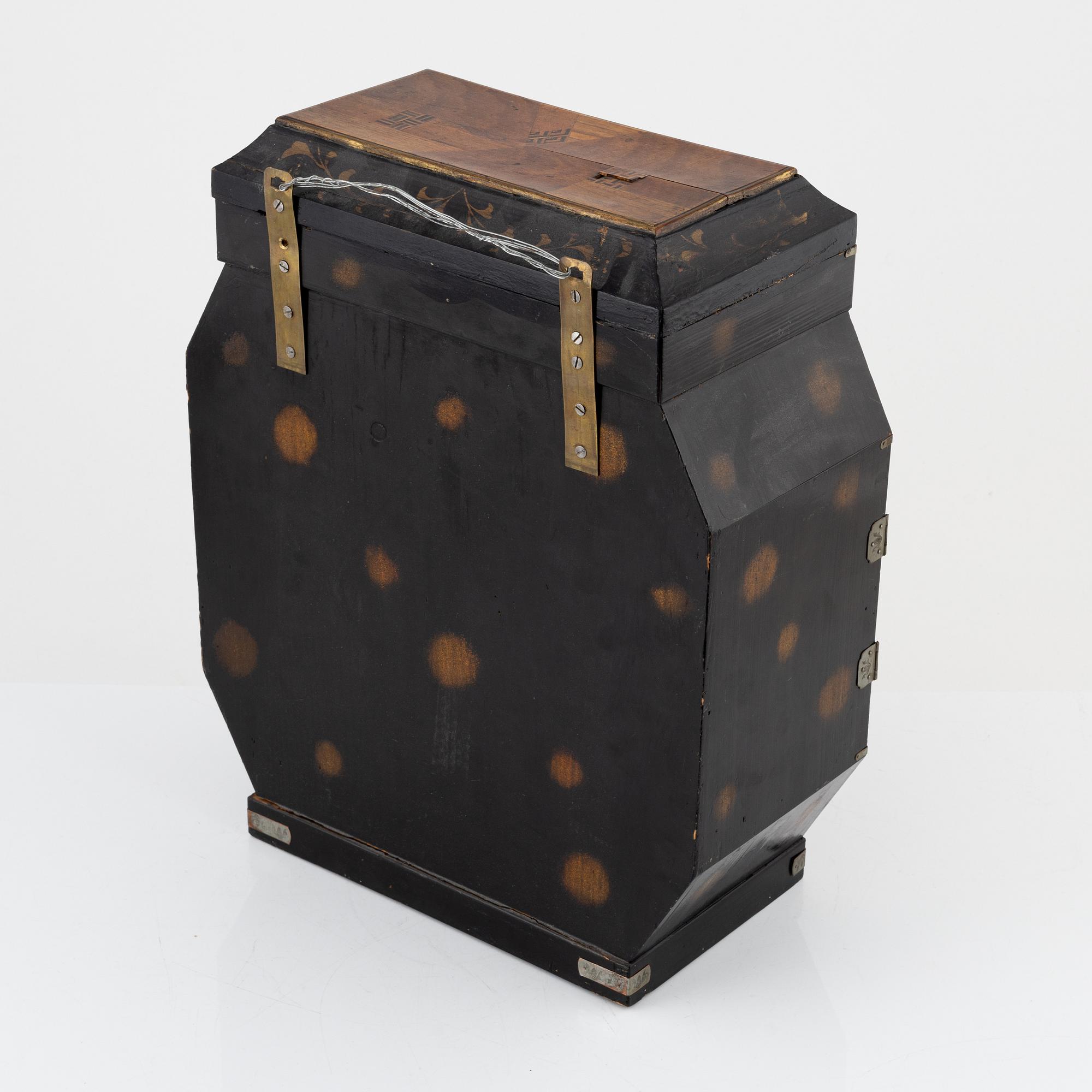 A Japenese partially lacquered hanging cabinet, early 20th century.