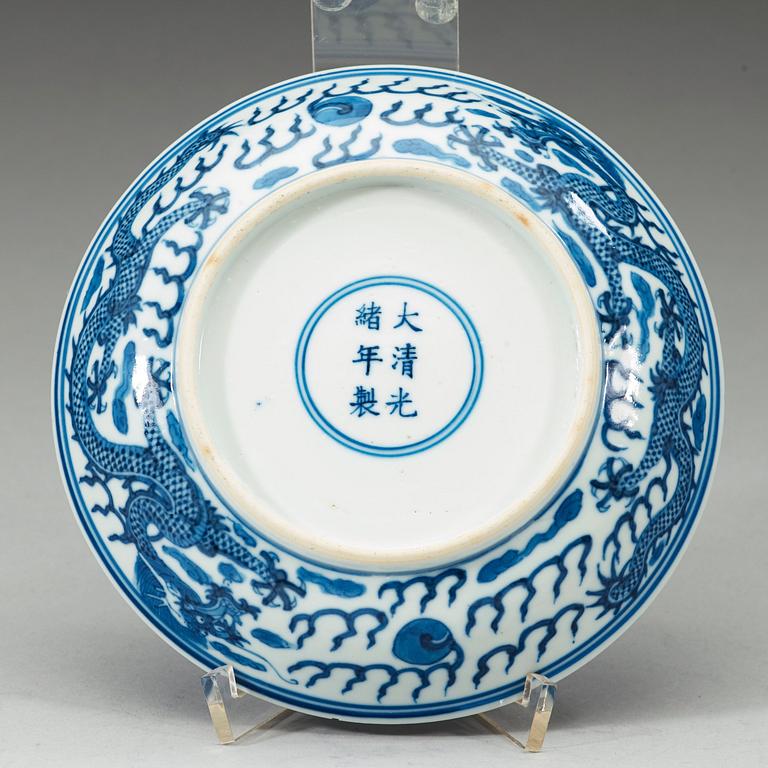 A blue and white dragon-dish, Qing dynasty, Guangxu six-character mark and of the period.