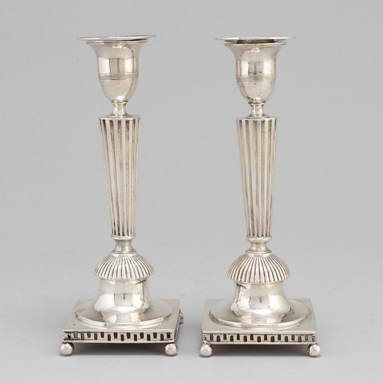 A Swedish pair of early 19th century silver candlesticks, mark of Petter Adolf Sjöberg, Stockholm 1813.