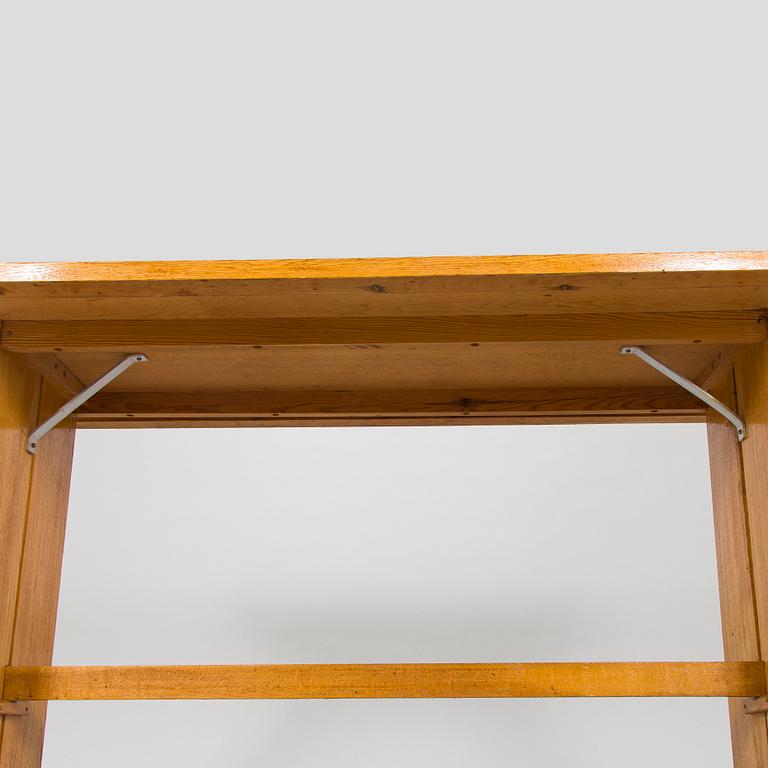 Dining table and two benches, mid-20th century.