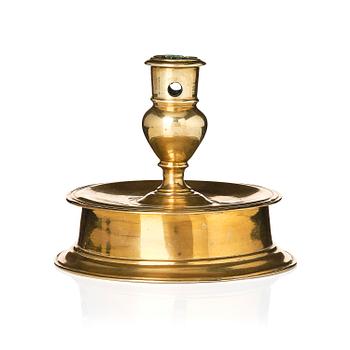 199. A Northern European baroque brass candlesticsk, late 17th century.