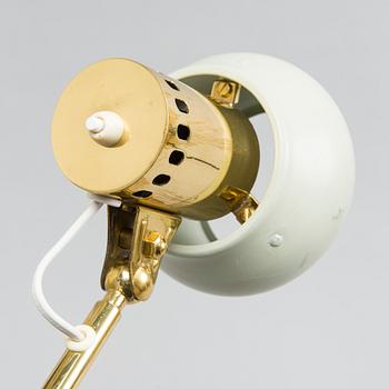 Ilmari Tapiovaara, a 1960s wall light for Metallikolmikko Oy.